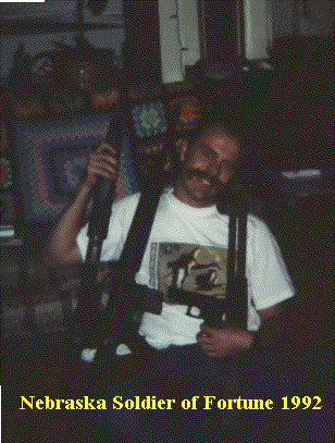 Mike holding weapons owned by friend